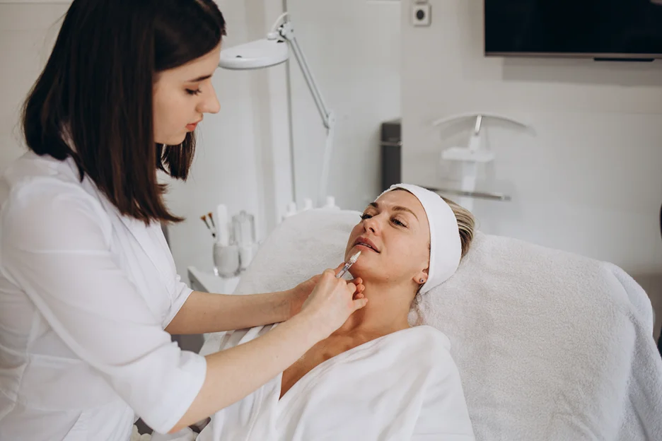 a woman received heart shape lip filler treatment